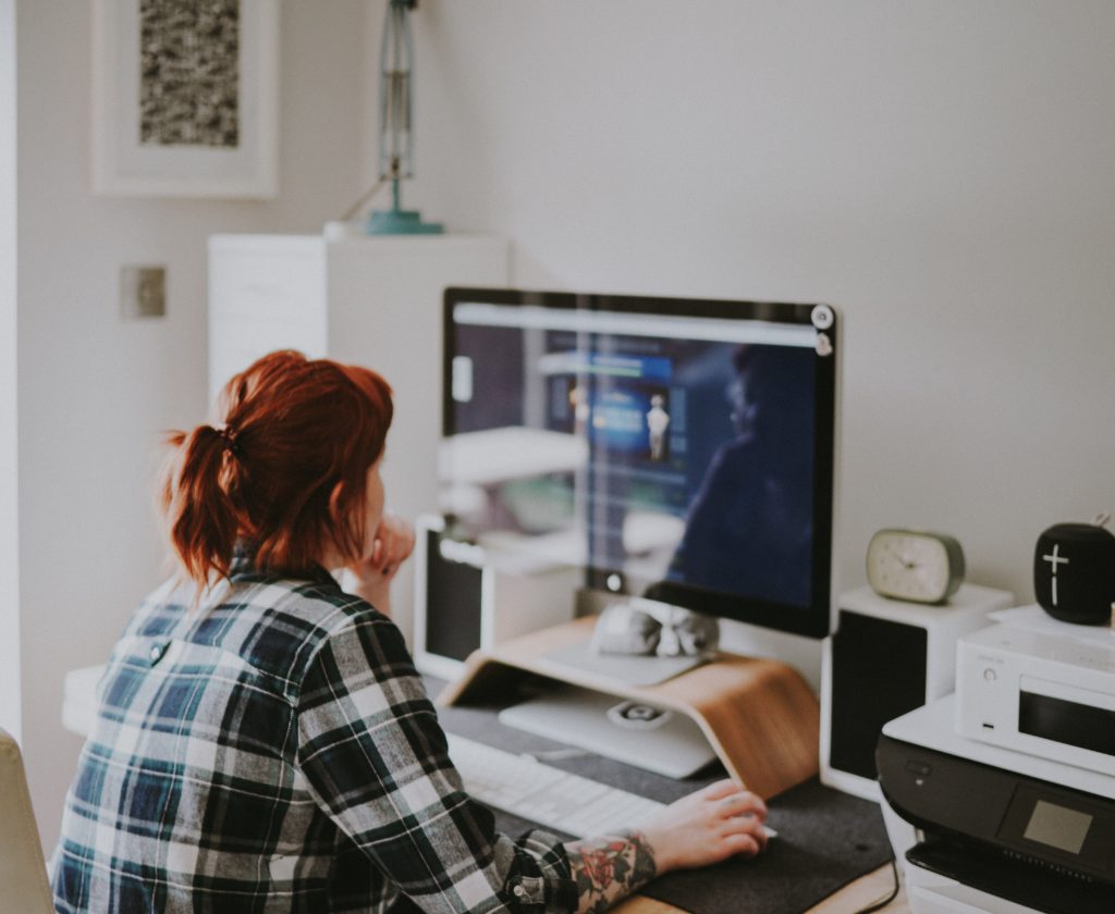 Woman at home computer.