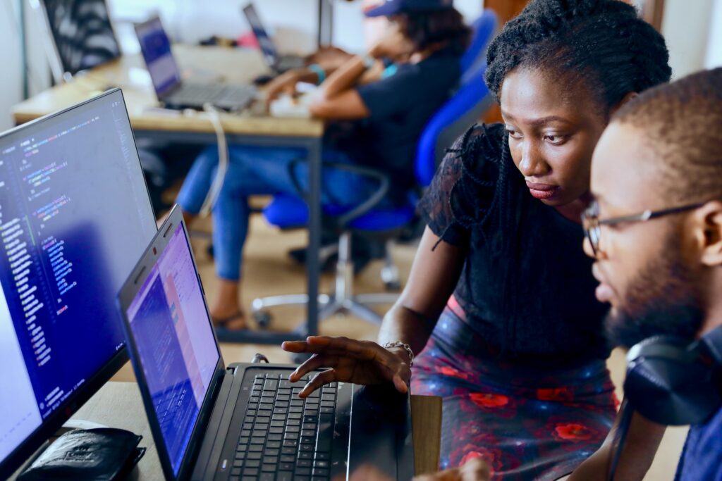 Students work together on a computer science project.