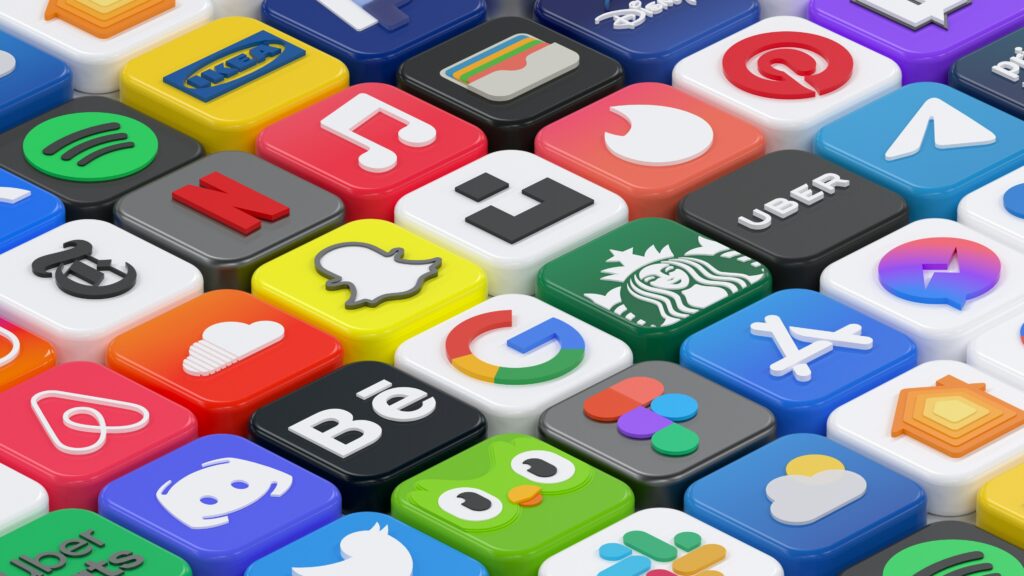 A digital image showing a diagonal, top-down view of realistic, dice-shaped iOS mobile application logos, staged in a perfect grid. Logos range from Google to Figma to Apple Music